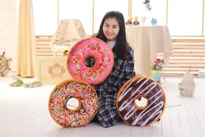 Cozy giant plush donut pillow scene detail showing soft textured cushion design for home office use.