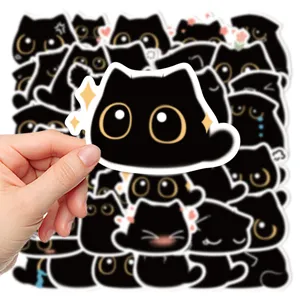Gros plan détail du set d'autocollants chat noir mignon avec finition brillante et nette.