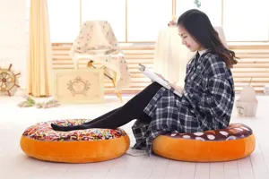 Soft giant donut plush pillow cushion, creative cute food shaped floor pillow for home decor.