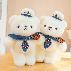 Cute sailor teddy bear plush toy in white, soft stuffed animal companion for kids bedroom.