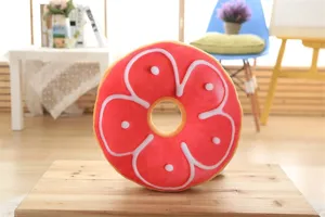 Detailed view of soft plush flower shaped throw pillow, cozy home decor cushion for sofa nap.
