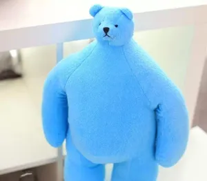 Funny blue muscle bear plush toy detail, cute comic oversized body pillow gift idea.