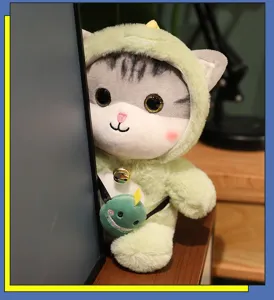 Detailed view of cute plush cat doll, soft green dinosaur costume toy for children.