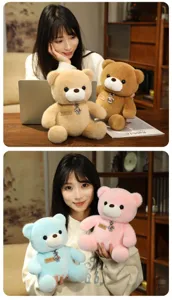 Cute sitting teddy bear plush toy, soft stuffed doll for girls, sweet gift, detail view.