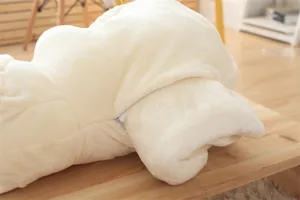 Soft plush elephant pillow detail, cozy fabric texture close up view, cute stuffed animal toy.