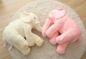Cozy plush elephant pillow details, soft stuffed animal toy for kids nursery room decor.