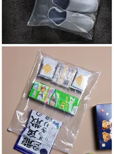 Transparent PEVA zipper storage bag, ideal for organizing shoes, clothes, socks, and travel items.