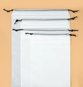 White frosted plastic drawstring bag detail view, matte finish with black cord close-up.