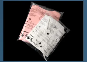 Clear PE packaging bag detail showing multi-language suffocation warning text and recycle icon.