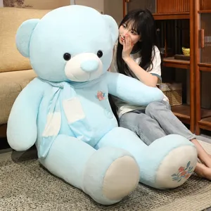 Orsacchiotto di peluche gigante azzurro con sciarpa e ricamo di rose per regalo.