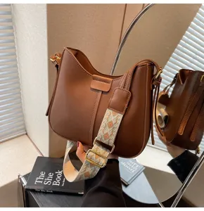 Brown leather shoulder bag for women, stylish wide strap bucket crossbody bag daily use
