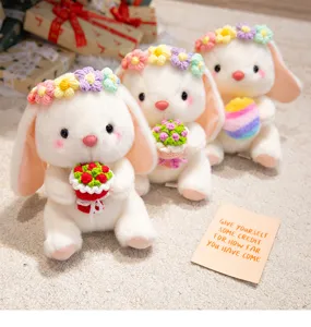 Cute healing bunny plush toy holding flowers, soft stuffed rabbit doll with floral wreath for gift.