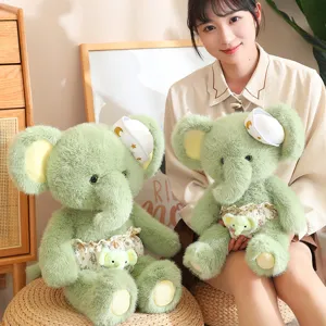 Cute green elephant plush toy, soft stuffed animal doll for kids cuddling and sleeping pillow.