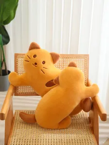 Detailed shot of the cute baguette cat plush toy, showing soft yellow fabric and details.