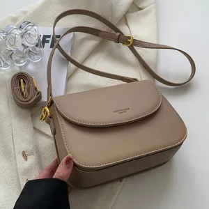 Minimalist khaki shoulder bag for women, stylish crossbody square bag with adjustable strap.