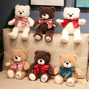 Simpatico peluche orsacchiotto giocattolo con grande fiocco, morbida bambola regalo