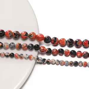 Close-up of faceted fire agate beads in 10mm, 8mm, 6mm sizes, perfect for DIY jewelry making.
