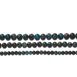 Detailed view of natural turquoise colored gemstone round loose beads for DIY jewelry making.