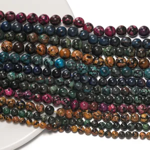 Detail view of colorful peacock jasper gemstone round beads, perfect for DIY jewelry making.