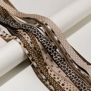 Brown patterned grosgrain ribbon set for DIY hair bows, gift wrapping, and crafts. Detail view.