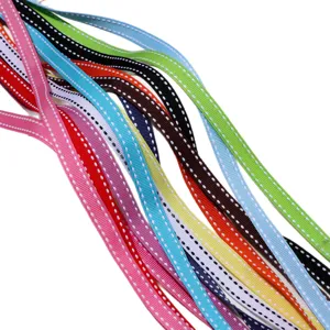 Colorful dotted grosgrain ribbon bundle for DIY hair bows, gift wrapping, and floral crafts.