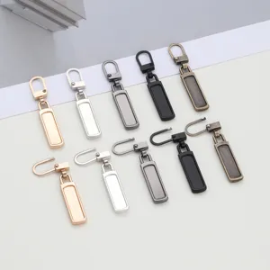 Metal detachable zipper pull replacement head, tool-free repair for jackets and bags detail.