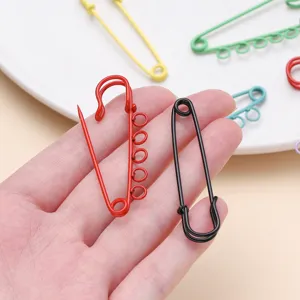 Colorful baked paint multi-hole safety pins for DIY crafts, brooches, and clothing accessories.