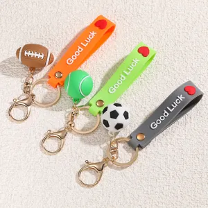 Cute mini sports ball keychains with silicone straps, perfect for backpacks and car keys.