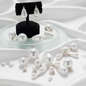 Details zu verschiedenen ABS Perlen Anhängern, tropfenförmig und rund für DIY Schmuck.