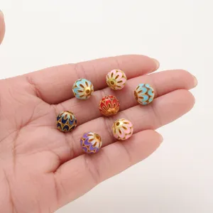 Detailed shot of vintage colorful enamel filigree loose beads for DIY handmade bracelets.