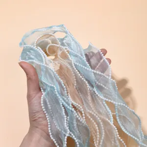 Pearl edge fishtail organza ribbon for DIY hair bows, crafts, and gift wrapping decoration.