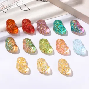 Perles en vrac hibou transparentes irisées doublées d'or pour la conception de bijoux DIY.