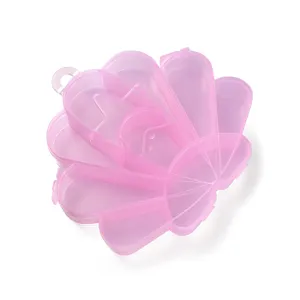 Scatola di immagazzinaggio conchiglia in plastica trasparente rosa, dettaglio.
