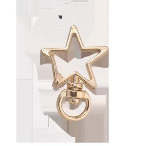 Mousqueton étoile doré avec pivot vue détaillée, accessoire de quincaillerie pour sac.