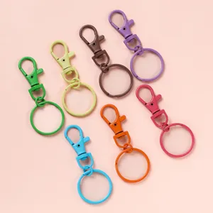 Colorful zinc alloy lobster clasp keychain rotating dog hook DIY bag charm accessory detail view.