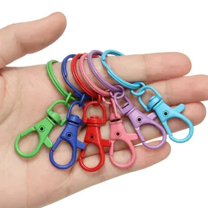 Colorful alloy lobster claw clasp detail, swivel snap hook and split ring for DIY bag charms.