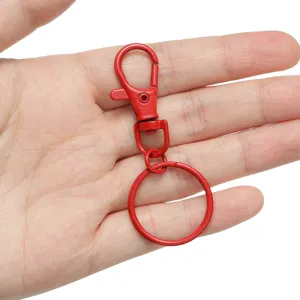 Close-up detail shot of red painted zinc alloy metal lobster clasp keychain with split ring.