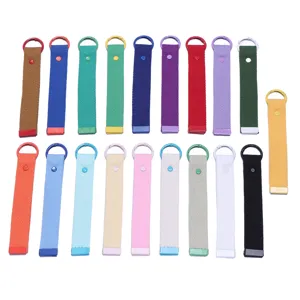 Detailed view of colorful woven ribbon keychains with various vibrant color choices.