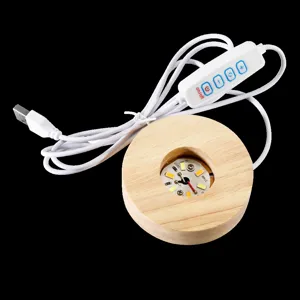 Socle d'affichage LED en bois pour veilleuse boule de cristal avec câble USB et interrupteur.