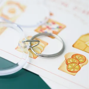 Clear acrylic blank photo frame keychain with metal ring for custom DIY gifts and keys.