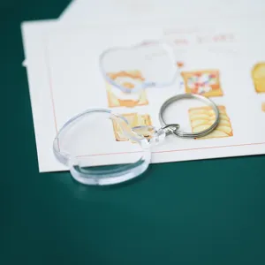 Clear acrylic blank photo frame keychain detail view showing transparent double design.