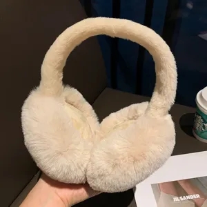 Winter warm plush earmuffs for women, soft furry fluffy ear warmers for outdoor skiing.