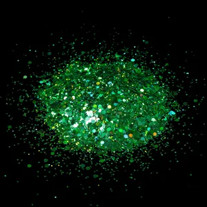 Vibrant green hexagonal nail art glitter powder for dazzling sparkling DIY craft decorations.