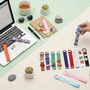 Colorful woven webbing keychain with cute embroidery patches, stylish bag hanging pendant.