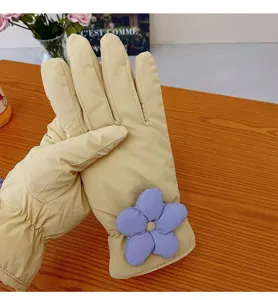 Women winter warm floral down gloves detail, featuring thick fabric and purple flower.