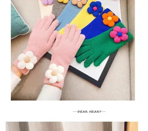 Detail view of women winter knit gloves with 3D sunflower decoration, soft and warm fit.