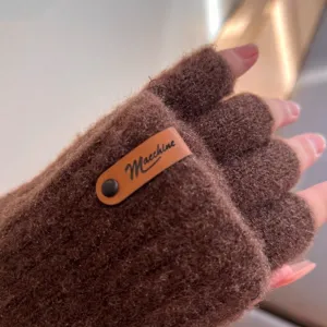 Brown knitted half-finger glove detail close up, showing textured vertical stripes and soft plush fabric.