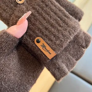 Brown knit fingerless gloves for winter warm wear, featuring vertical stripes and leather label.