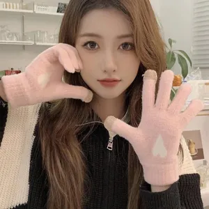 Cute winter touchscreen knit gloves for women, pink warm full finger gloves with heart design.