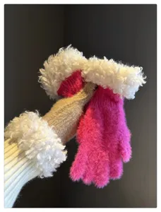 Fluffy knit gloves detail showing soft plush texture and cozy white faux fur cuff design.